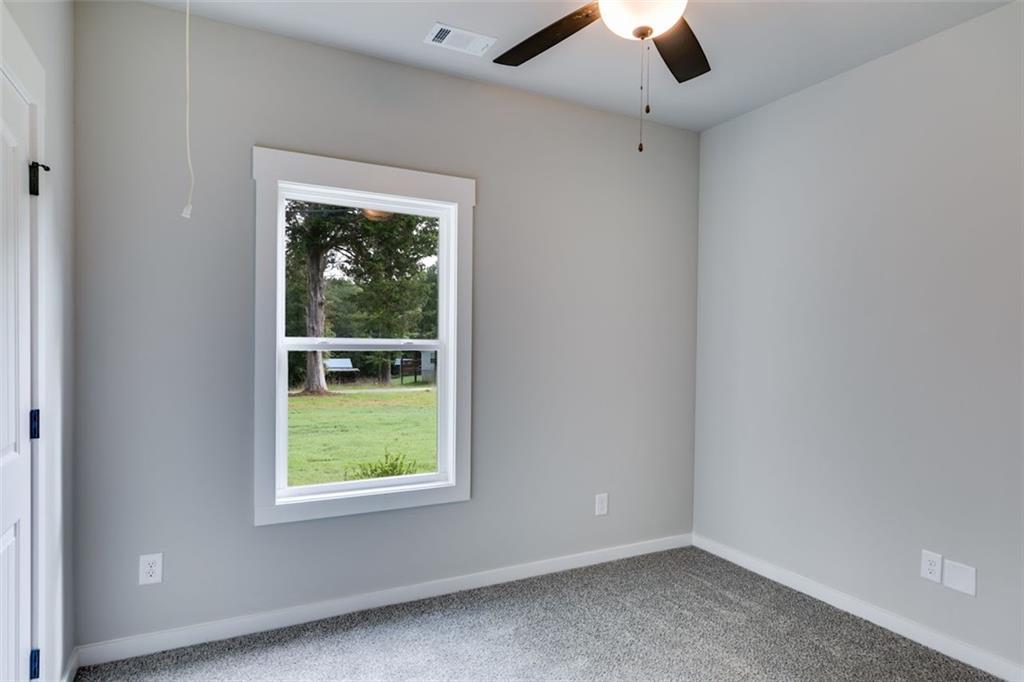 466 Mt Zion Church Road Tallapoosa, GA 30176 - Photo 21 of 35 an empty room with a window