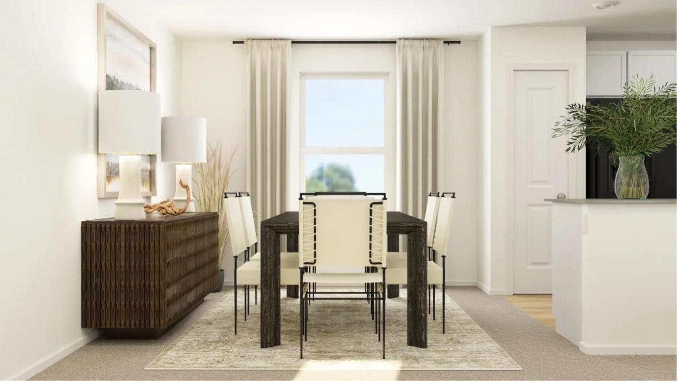 165 Bugbee Kyle, TX 78640 - Photo 3 of 15 a view of a dining room with furniture and a potted plant