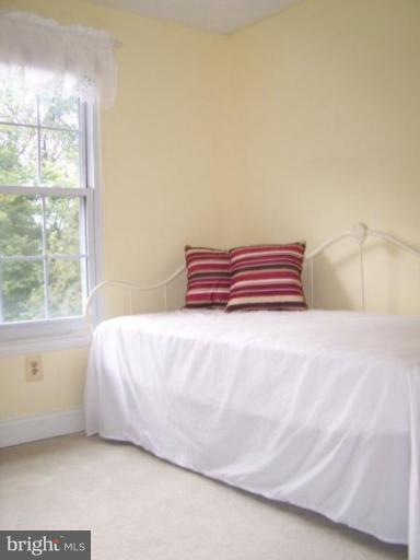 4005 Rustico Road Middle River, MD 21220 - Photo 11 of 20 a bedroom with a bed and a window