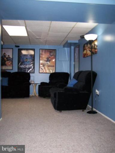 4005 Rustico Road Middle River, MD 21220 - Photo 15 of 20 a living room with furniture and painting on the wall