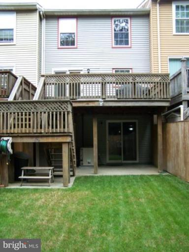 4005 Rustico Road Middle River, MD 21220 - Photo 4 of 20 a view of a house with a backyard and deck
