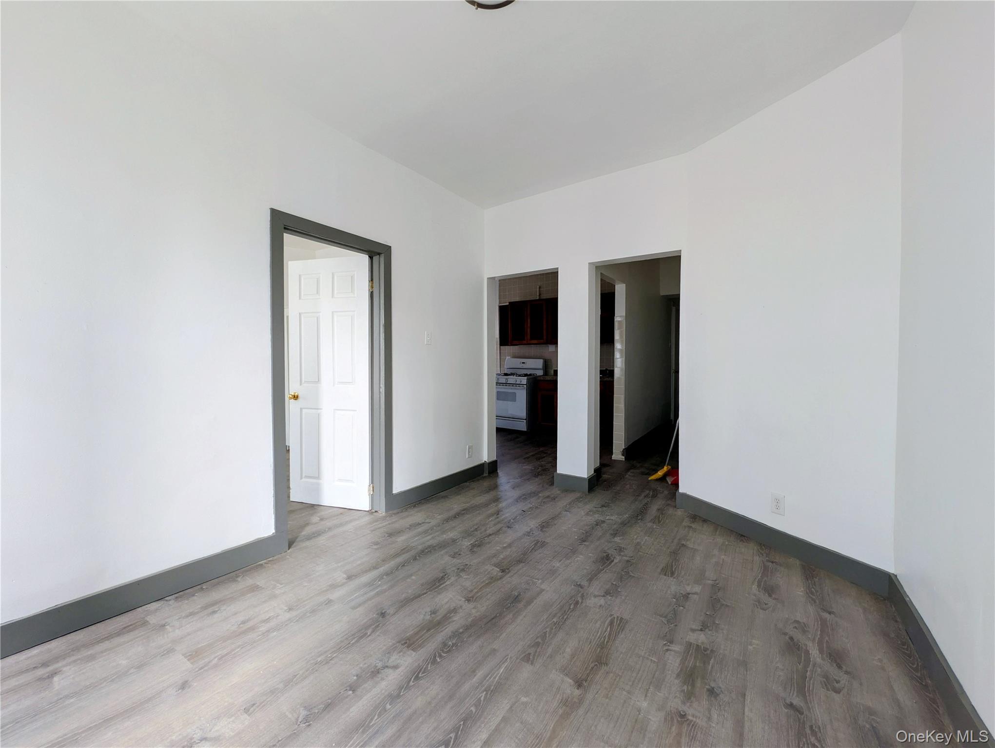 149 South 4th Street, Unit 25 Brooklyn, NY 11211 - Photo 12 of 12 an empty room with closet and a window
