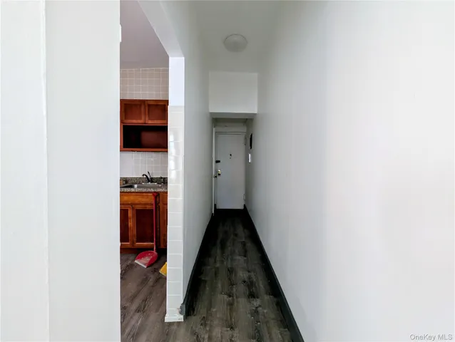 a view of hallway and closet