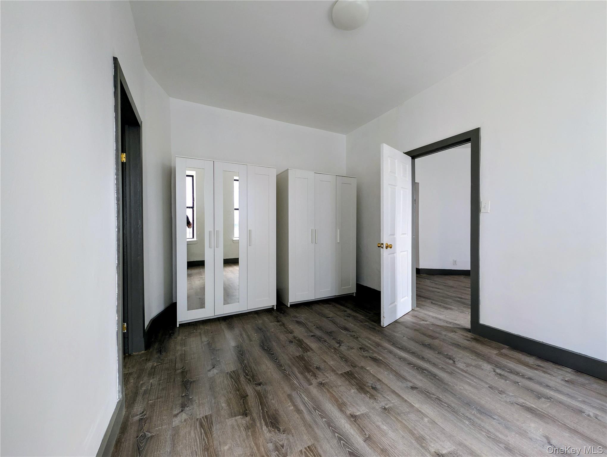 149 South 4th Street, Unit 25 Brooklyn, NY 11211 - Photo 10 of 12 a view of a livingroom with wooden floor
