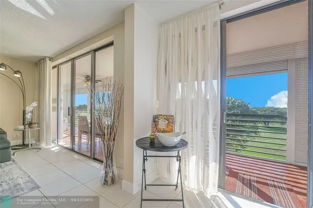 a bathroom with a sink mirror vanity and toilet