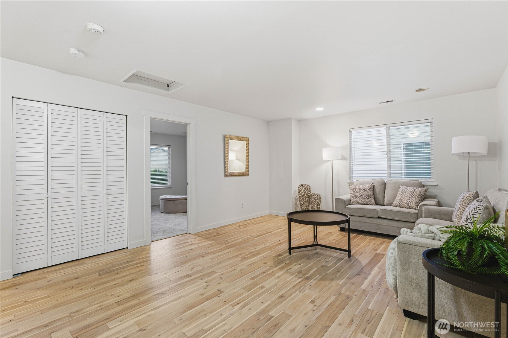 2513 Northeast 2nd Street Renton, WA 98056 - Photo 17 of 38 a living room with furniture and wooden floor