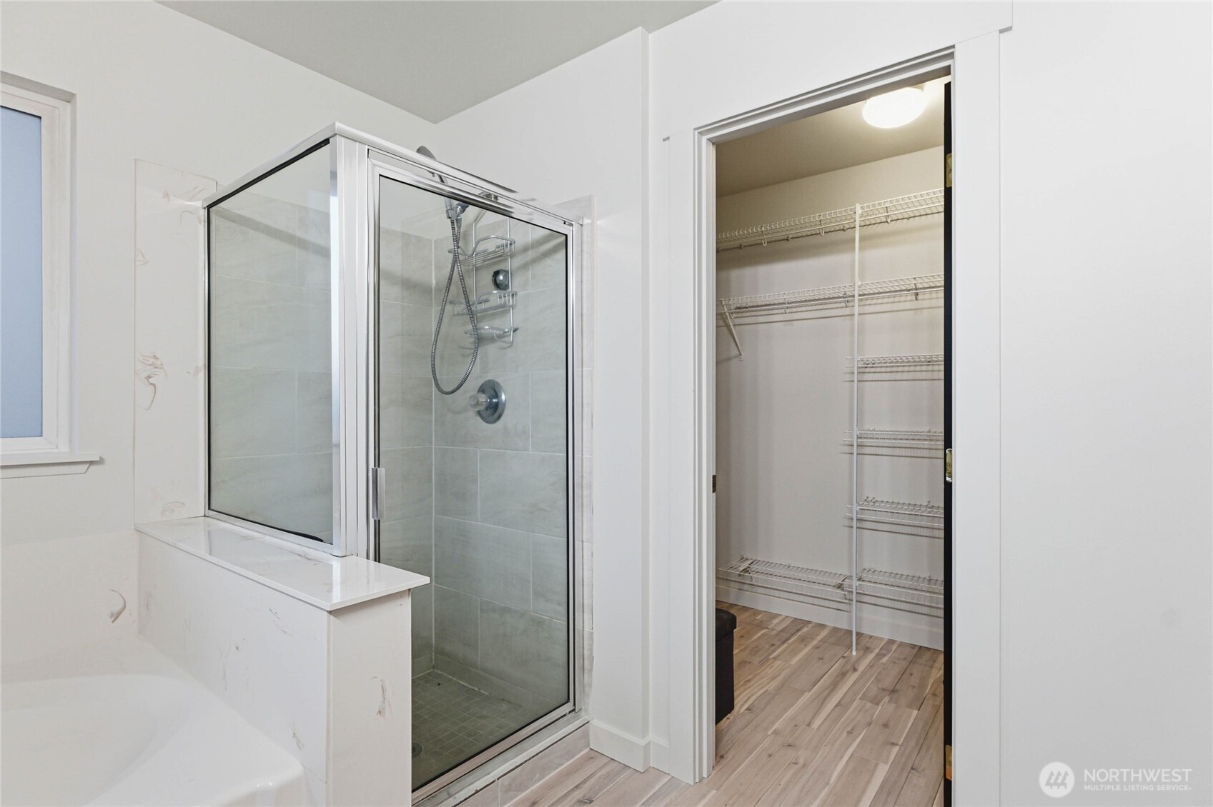 2513 Northeast 2nd Street Renton, WA 98056 - Photo 24 of 38 a bathroom with a glass shower door