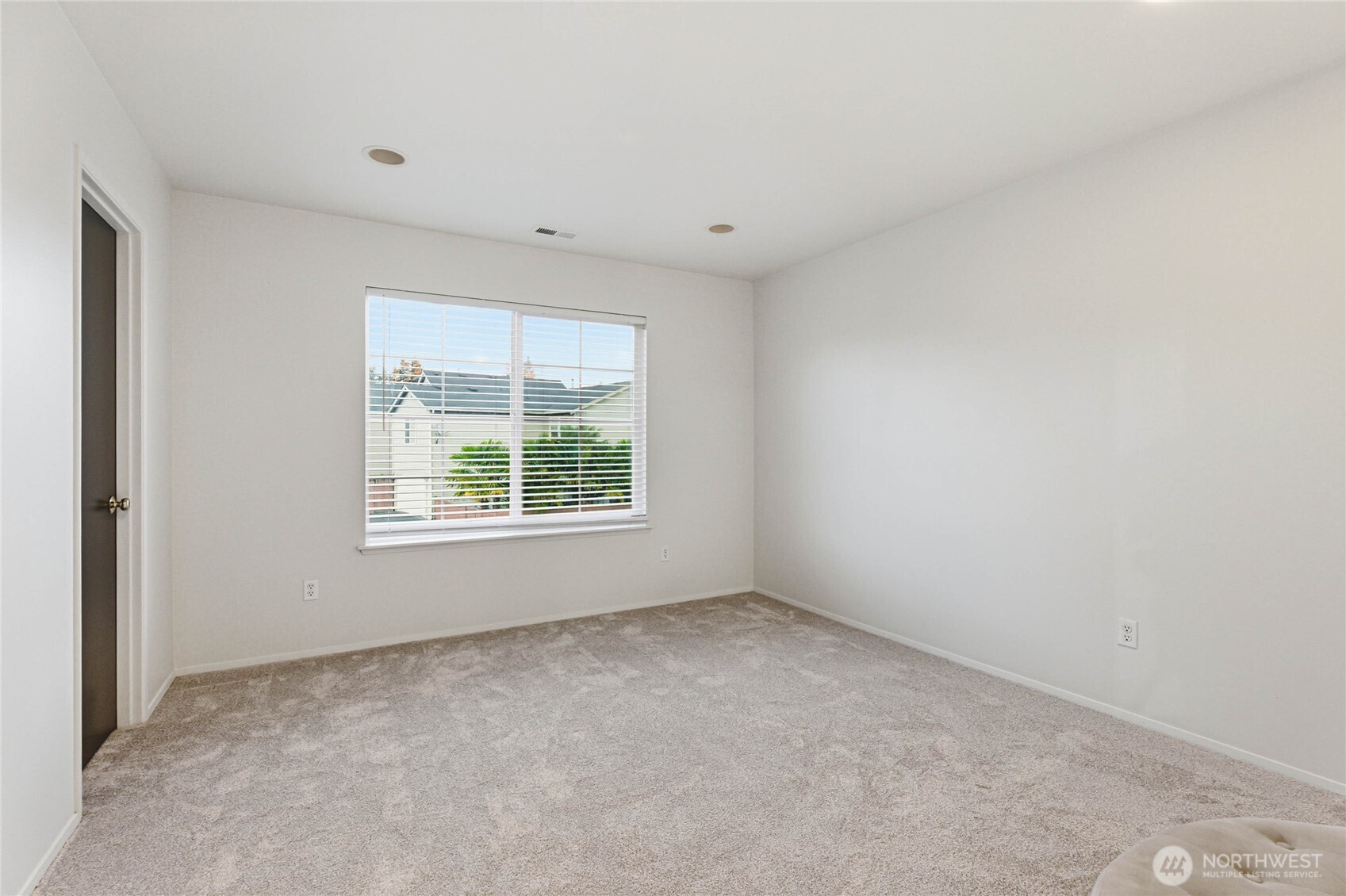 2513 Northeast 2nd Street Renton, WA 98056 - Photo 29 of 38 a view of an empty room with a window