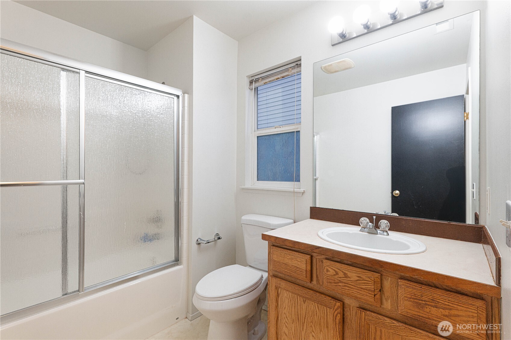 2513 Northeast 2nd Street Renton, WA 98056 - Photo 30 of 38 a bathroom with a granite countertop sink toilet and shower