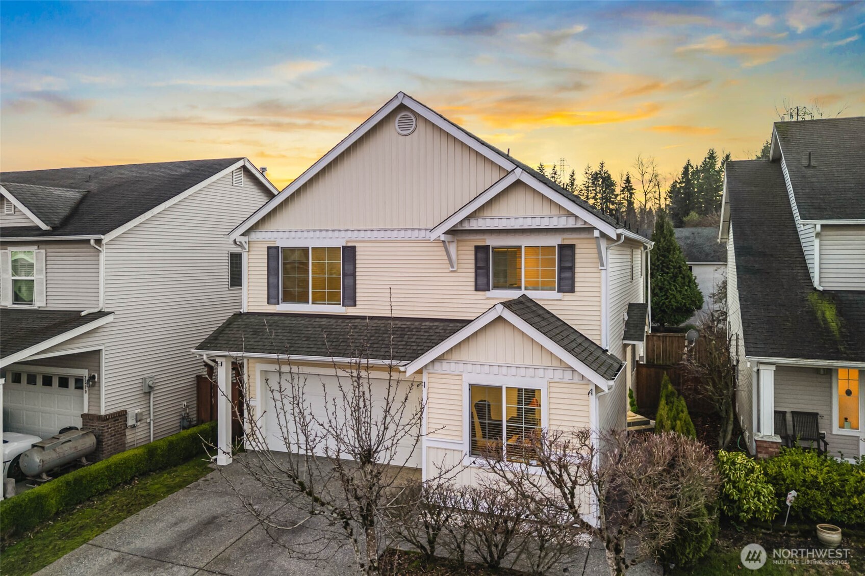 2513 Northeast 2nd Street Renton, WA 98056 - Photo 3 of 38 a view of house with a yard and potted plants