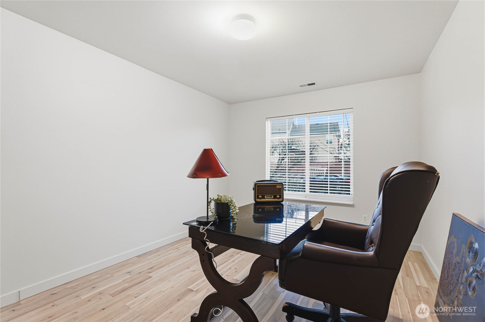 2513 Northeast 2nd Street Renton, WA 98056 - Photo 31 of 38 a view of a workspace with furniture and a window