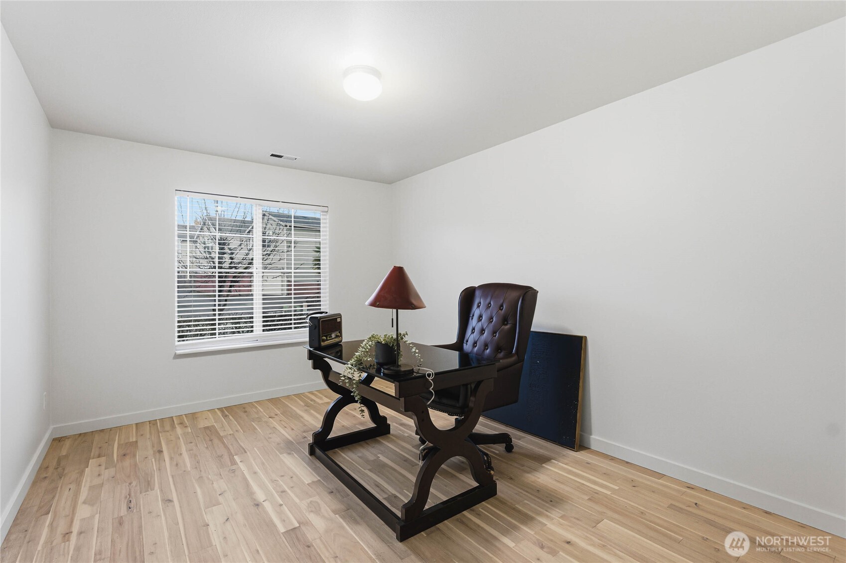 2513 Northeast 2nd Street Renton, WA 98056 - Photo 32 of 38 a workspace with furniture and a window