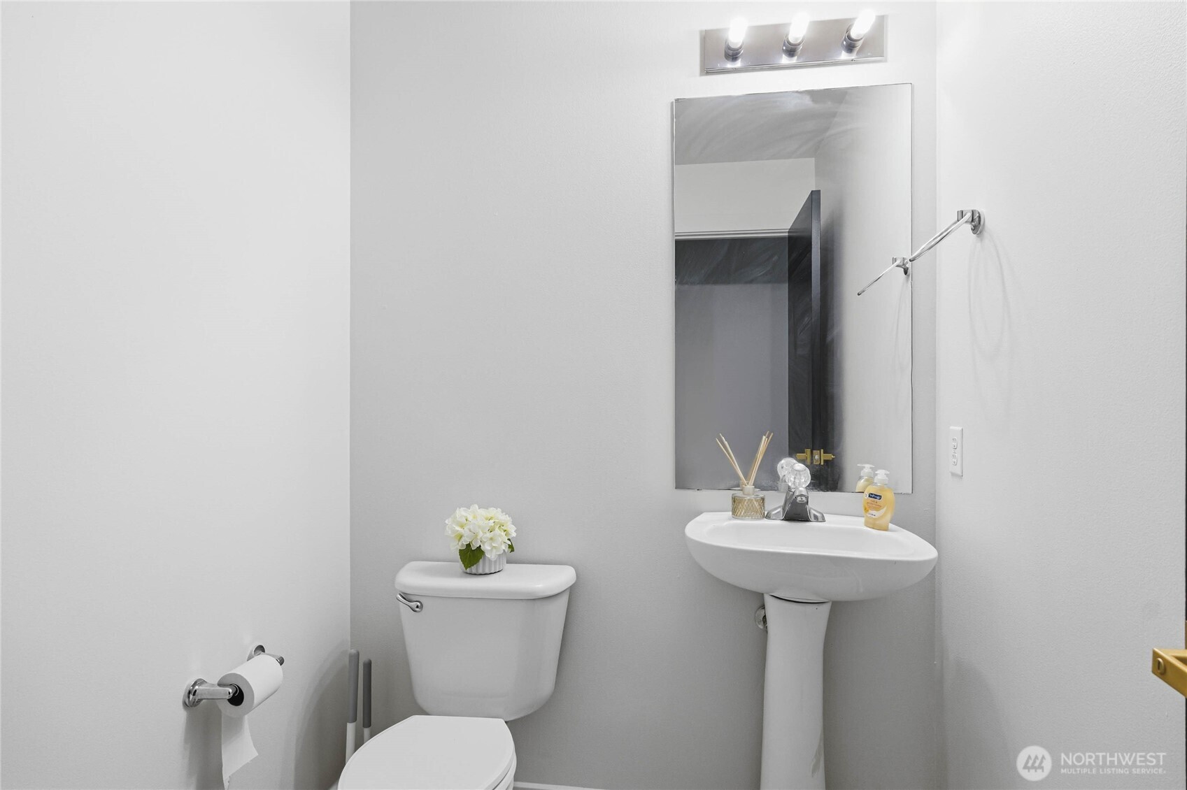 2513 Northeast 2nd Street Renton, WA 98056 - Photo 33 of 38 a bathroom with a sink toilet and a mirror