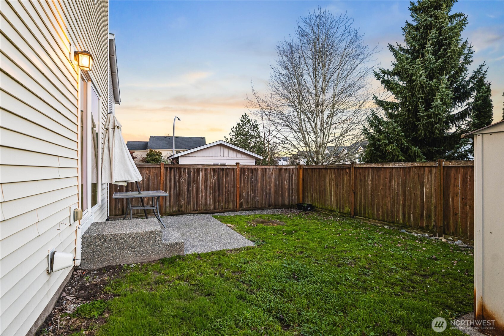 2513 Northeast 2nd Street Renton, WA 98056 - Photo 34 of 38 a view of a porch with a bench and wooden fence