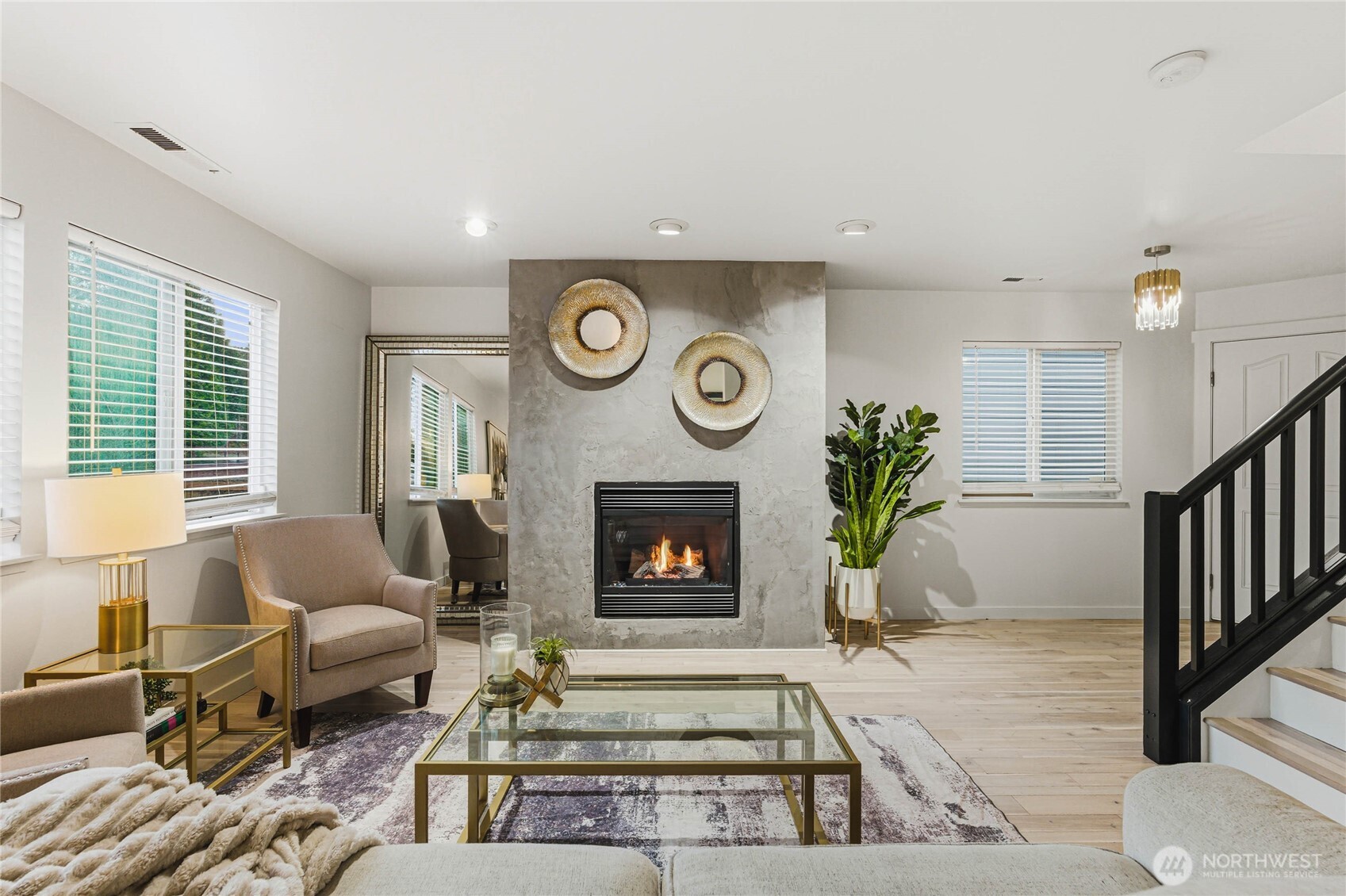 2513 Northeast 2nd Street Renton, WA 98056 - Photo 6 of 38 a living room with furniture and a fireplace