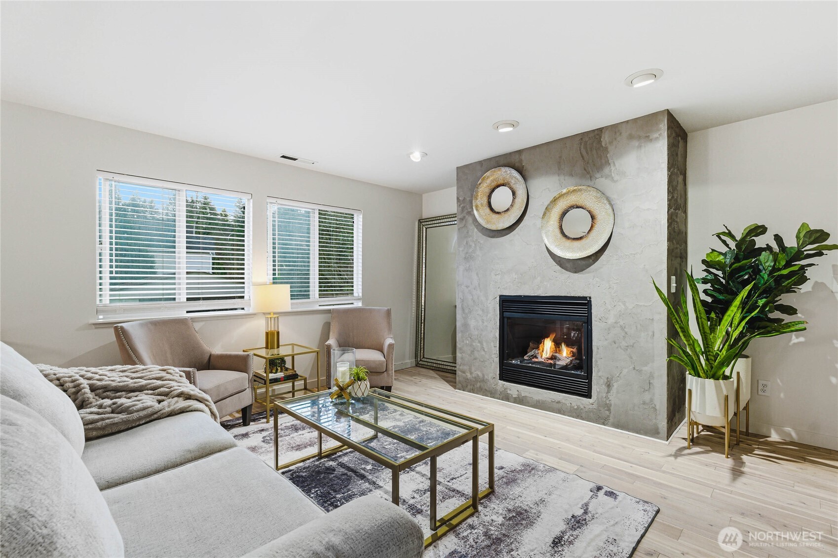 2513 Northeast 2nd Street Renton, WA 98056 - Photo 8 of 38 a living room with furniture and a fireplace
