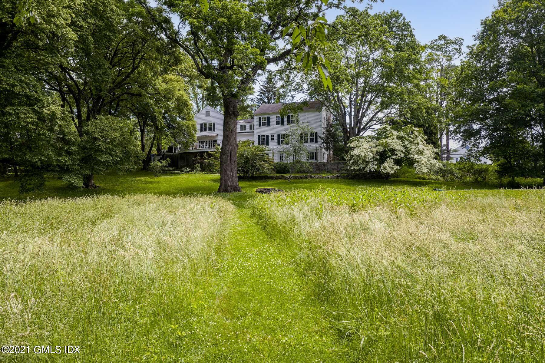 262 Stanwich Road Greenwich, CT 06830 - Photo 22 of 32 a view of a trees in front of a house