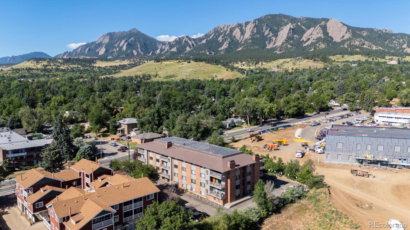 2141 Baseline Road, Unit 4 Boulder, CO 80302 - Photo 5 of 22 an aerial view of residential houses with outdoor space and trees