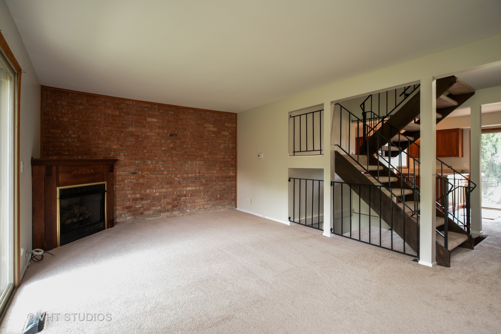 77 Mineola Road, Unit 77 Fox Lake, IL 60020 - Photo 4 of 24 a view of an empty room with stairs