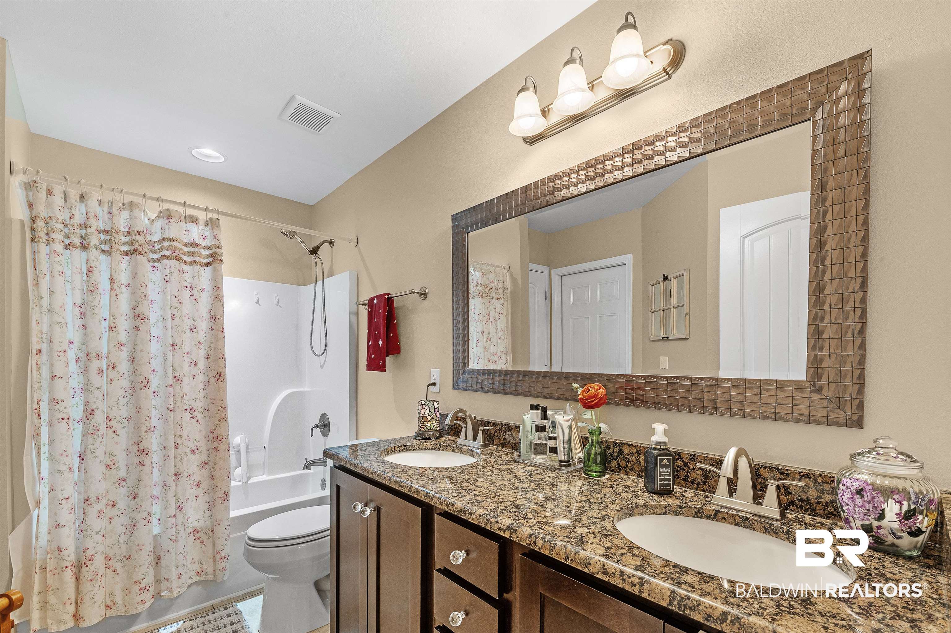 2033 Bourbon Street Foley, AL 36535 - Photo 48 of 57 With double vanity and access to the screened-in porch