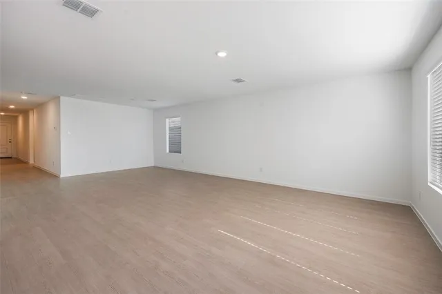 a kitchen with stainless steel appliances a sink stove and refrigerator