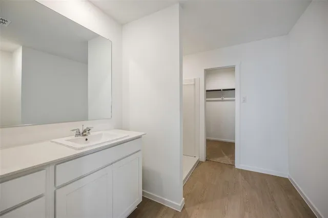 a bathroom with a sink and toilet