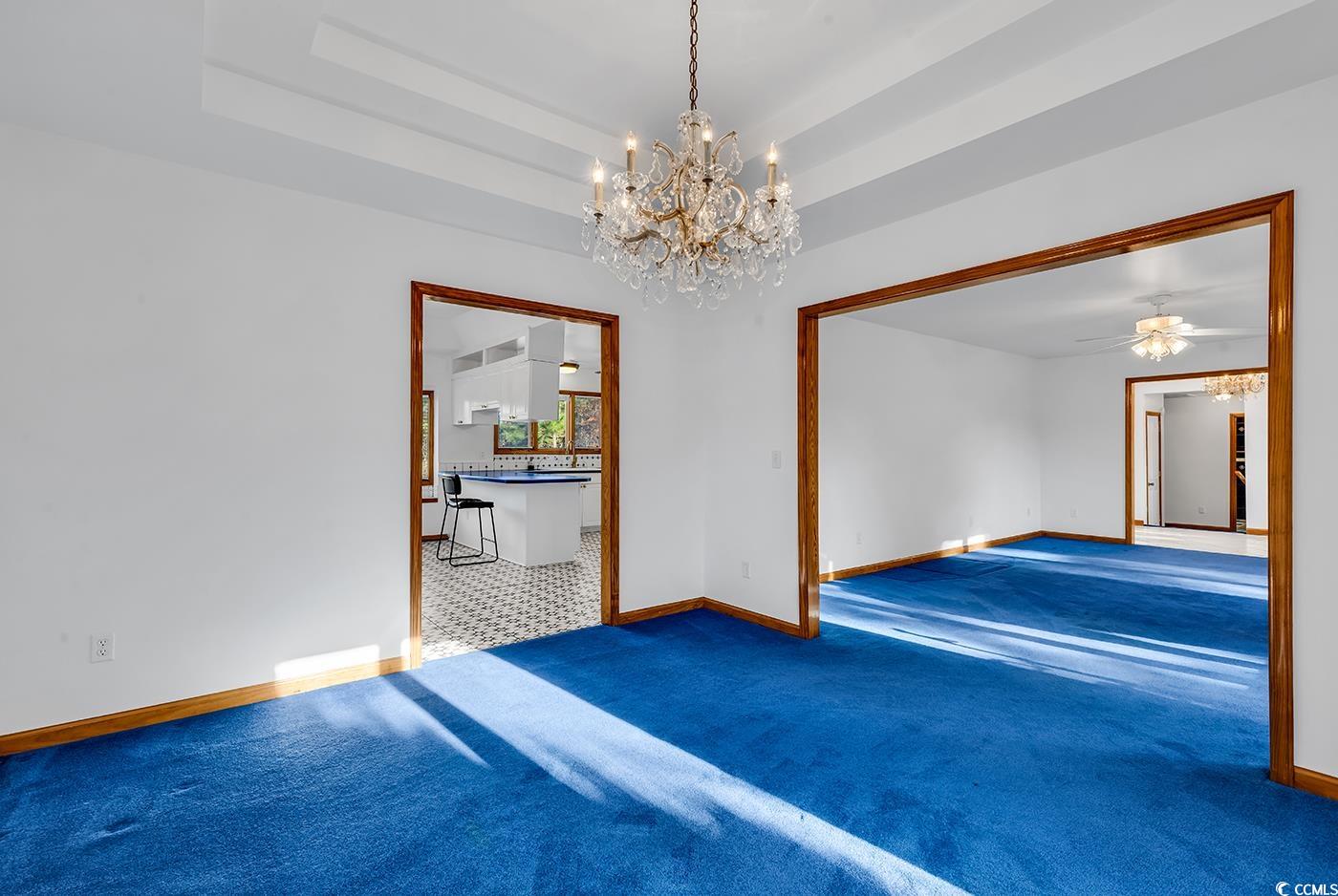 5938 Rahnavard Boulevard Myrtle Beach, SC 29588 - Photo 6 of 39 Carpeted spare room featuring ceiling fan with not