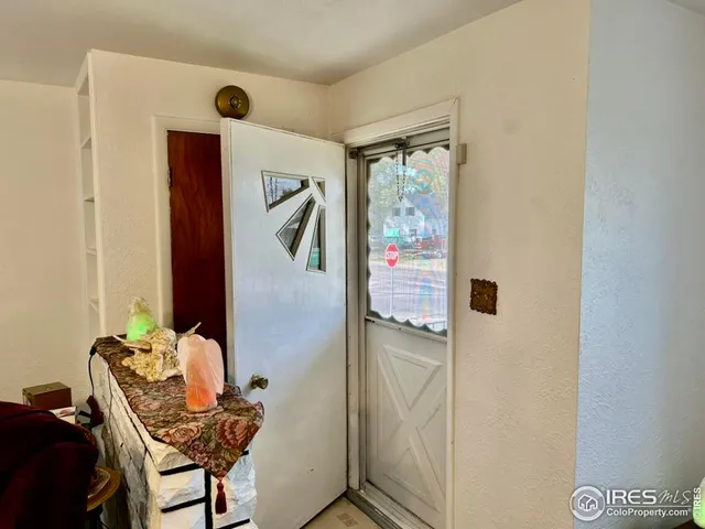 a room with furniture and window