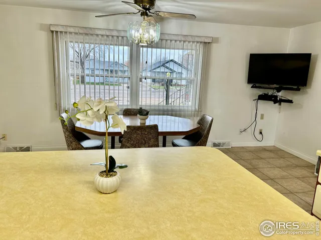 a view of a livingroom with furniture