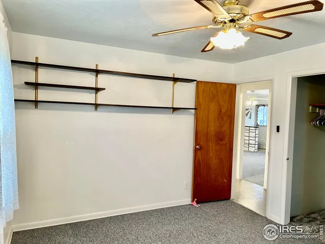 a view of a hallway with closet