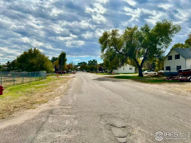 a view of road with trees