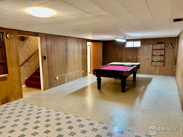 a livingroom with furniture and window