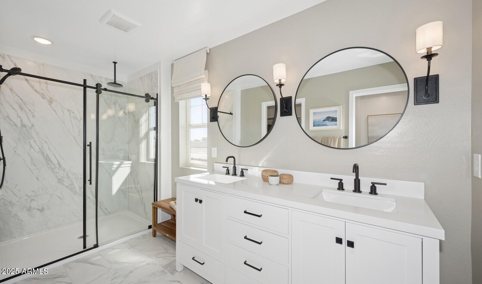 8014 West Royal Palm Road Peoria, AZ 85345 - Photo 33 of 37 a bathroom with a double vanity sink mirror and a mirror