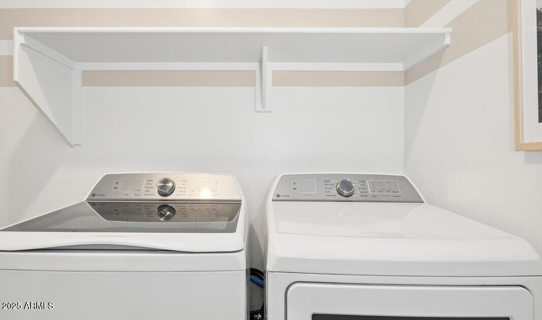 8014 West Royal Palm Road Peoria, AZ 85345 - Photo 35 of 37 a utility room with dryer and washer