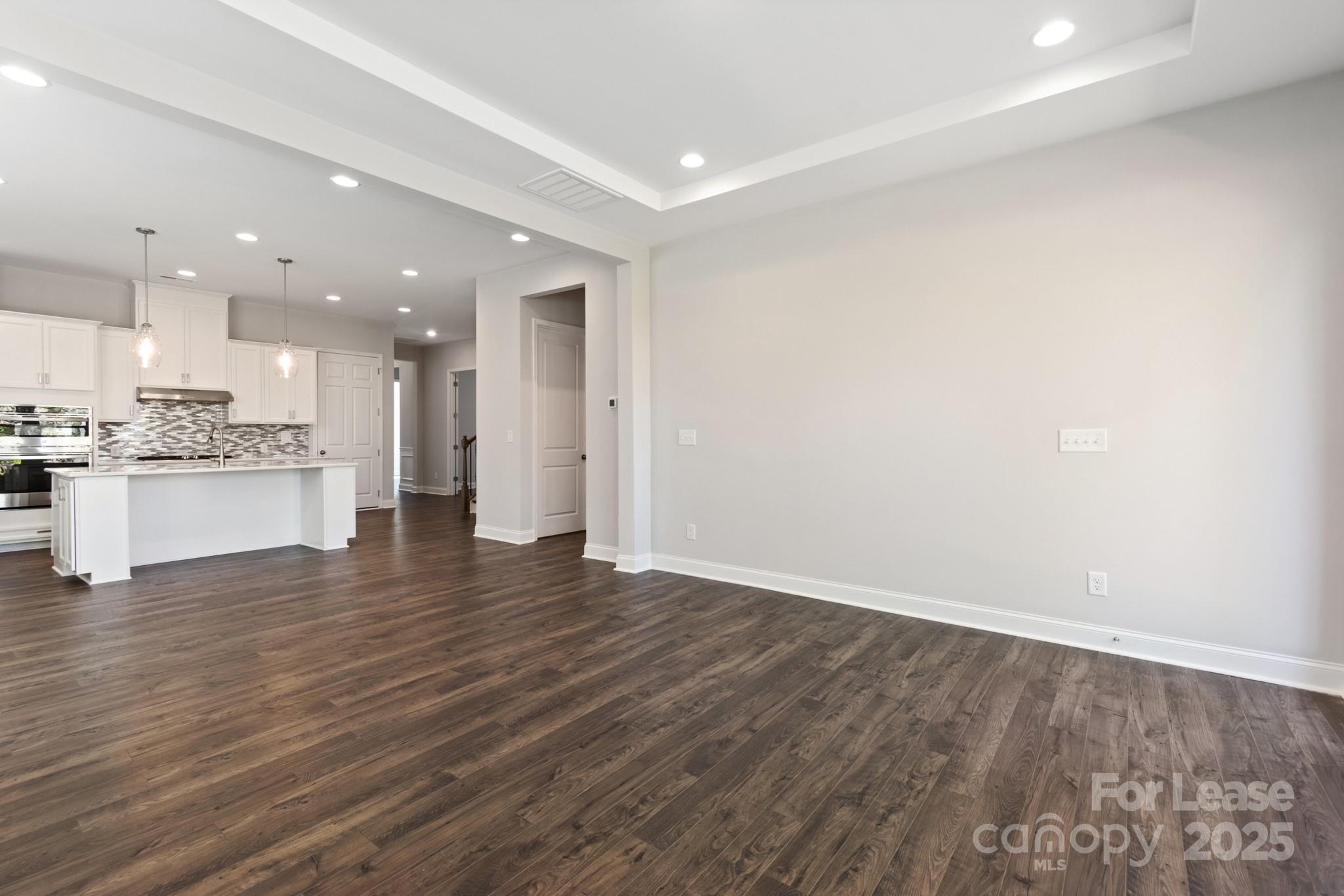 17118 Sand Bank Road Charlotte, NC 28278 - Photo 16 of 37 a view of kitchen with wooden floor