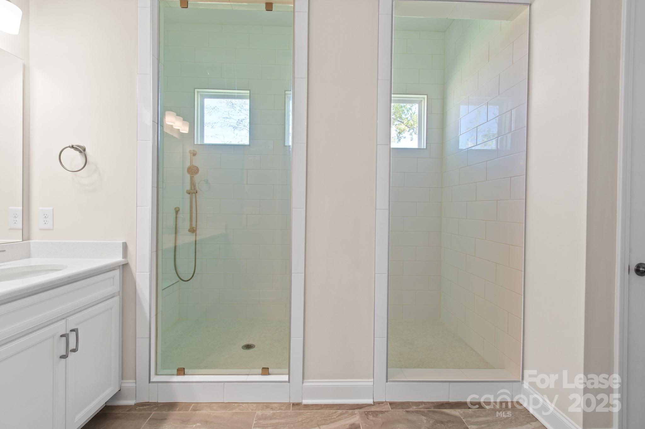 17118 Sand Bank Road Charlotte, NC 28278 - Photo 20 of 37 a bathroom with a shower