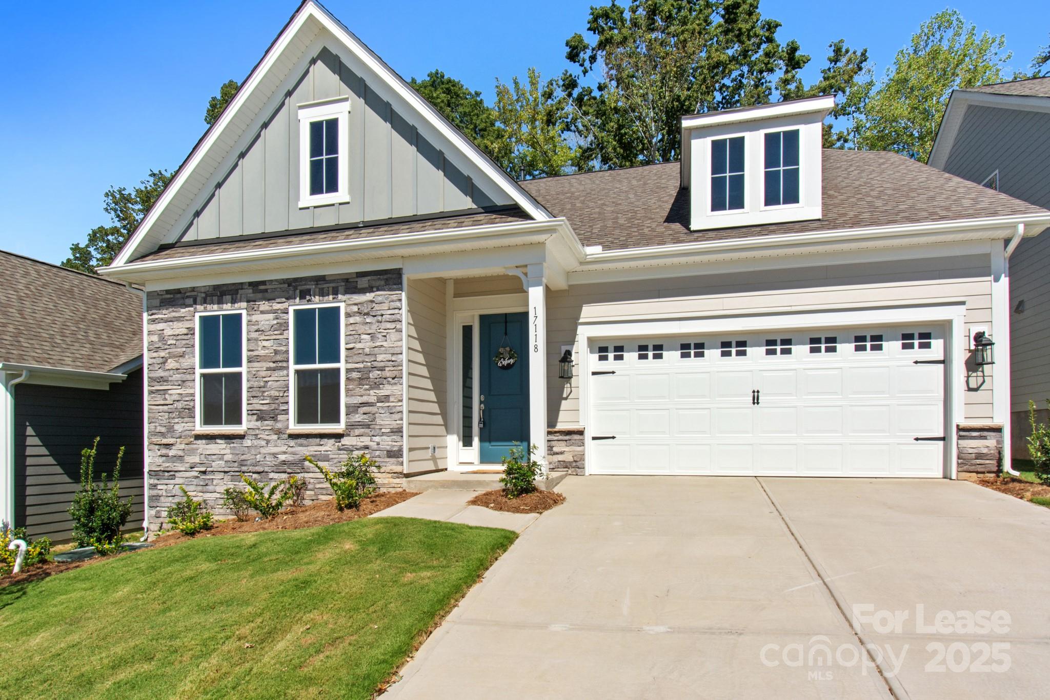 17118 Sand Bank Road Charlotte, NC 28278 - Photo 30 of 37 a view of house with yard