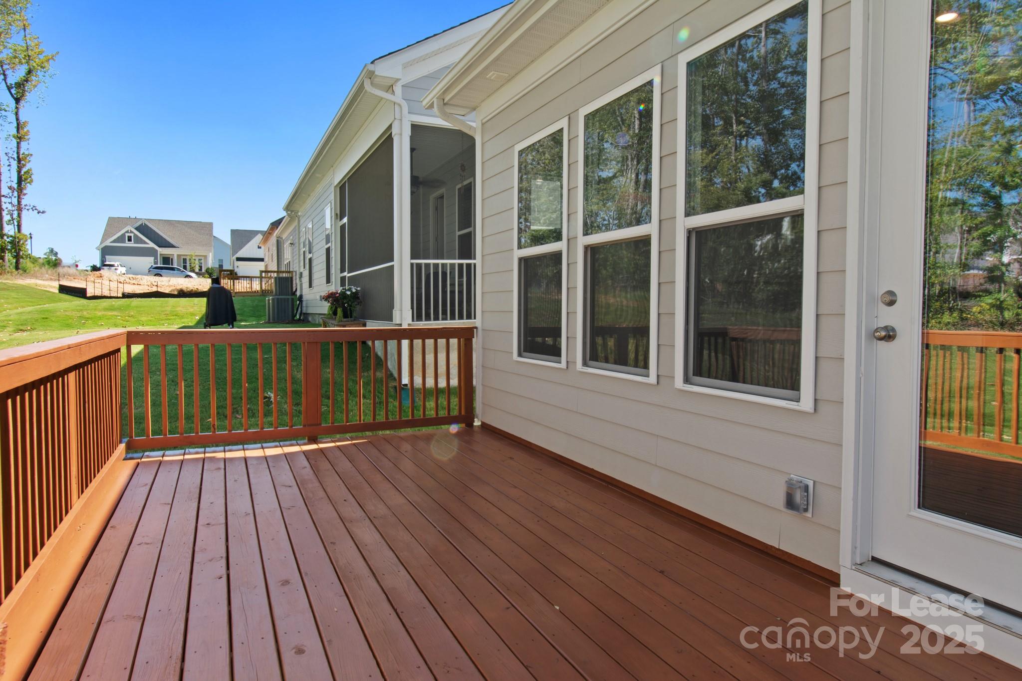 17118 Sand Bank Road Charlotte, NC 28278 - Photo 31 of 37 a view of a house with a wooden deck
