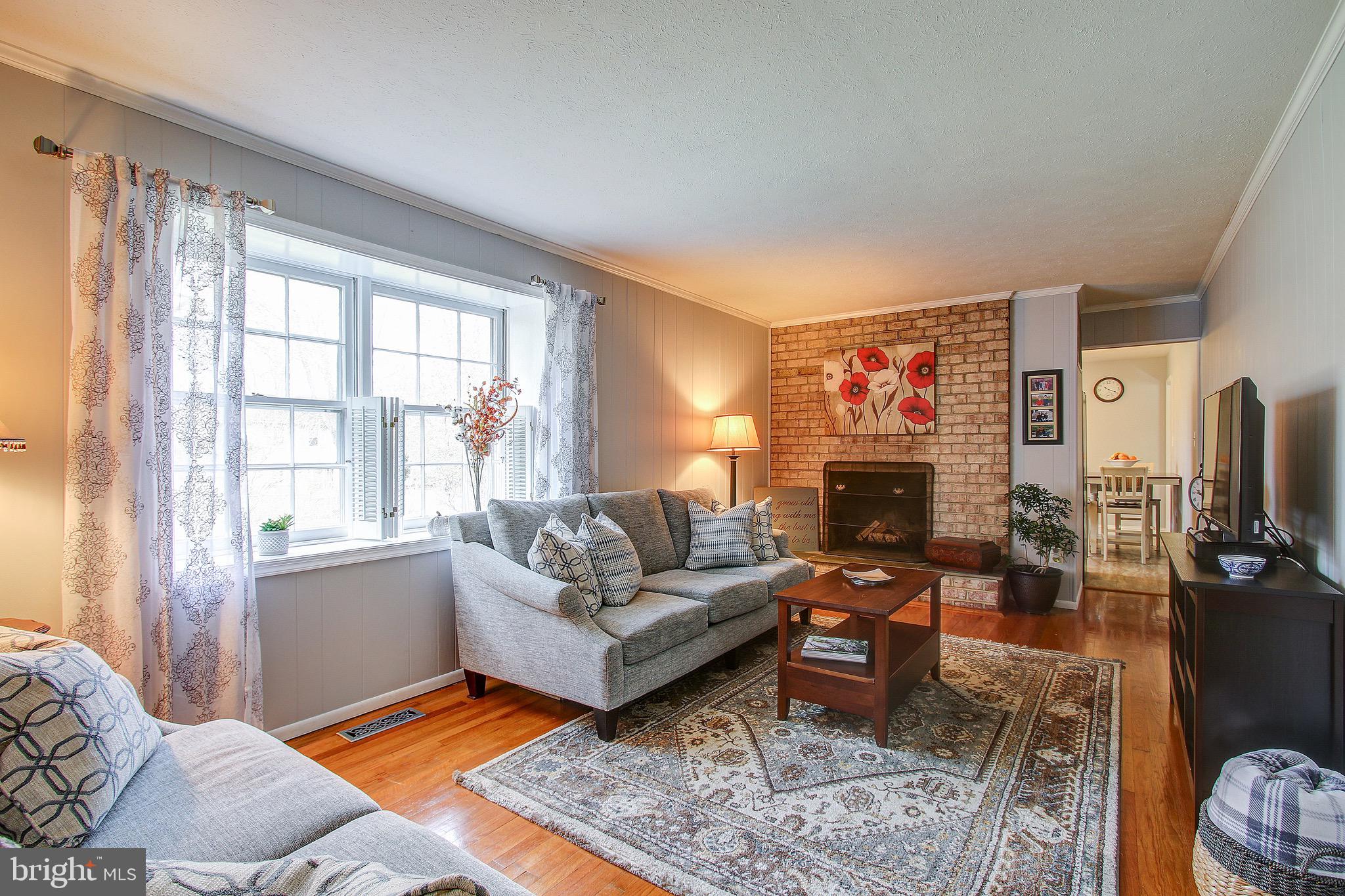 18708 Willow Grove Road Olney, MD 20832 - Photo 15 of 35 Family Room with Wood-Burning Fireplace