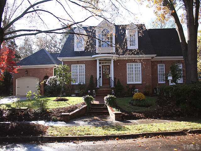3303 Ruffin Street Raleigh, NC 27607 - Photo 1 of 25 front view of house with a yard