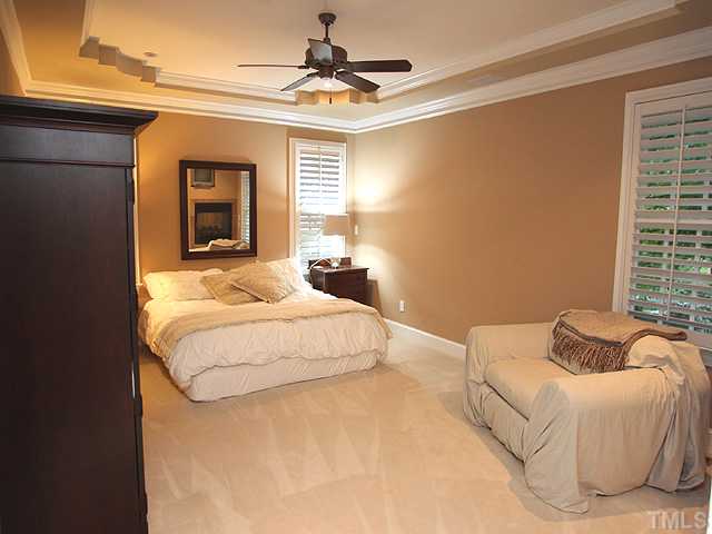 3303 Ruffin Street Raleigh, NC 27607 - Photo 13 of 25 a bedroom with a bed and a window