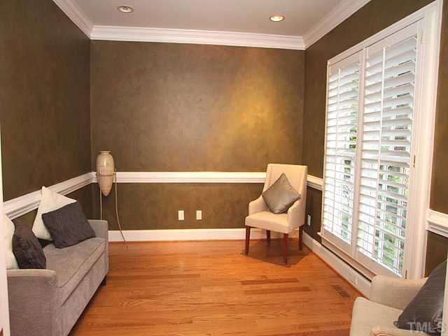 3303 Ruffin Street Raleigh, NC 27607 - Photo 3 of 25 a living room with furniture and a large window