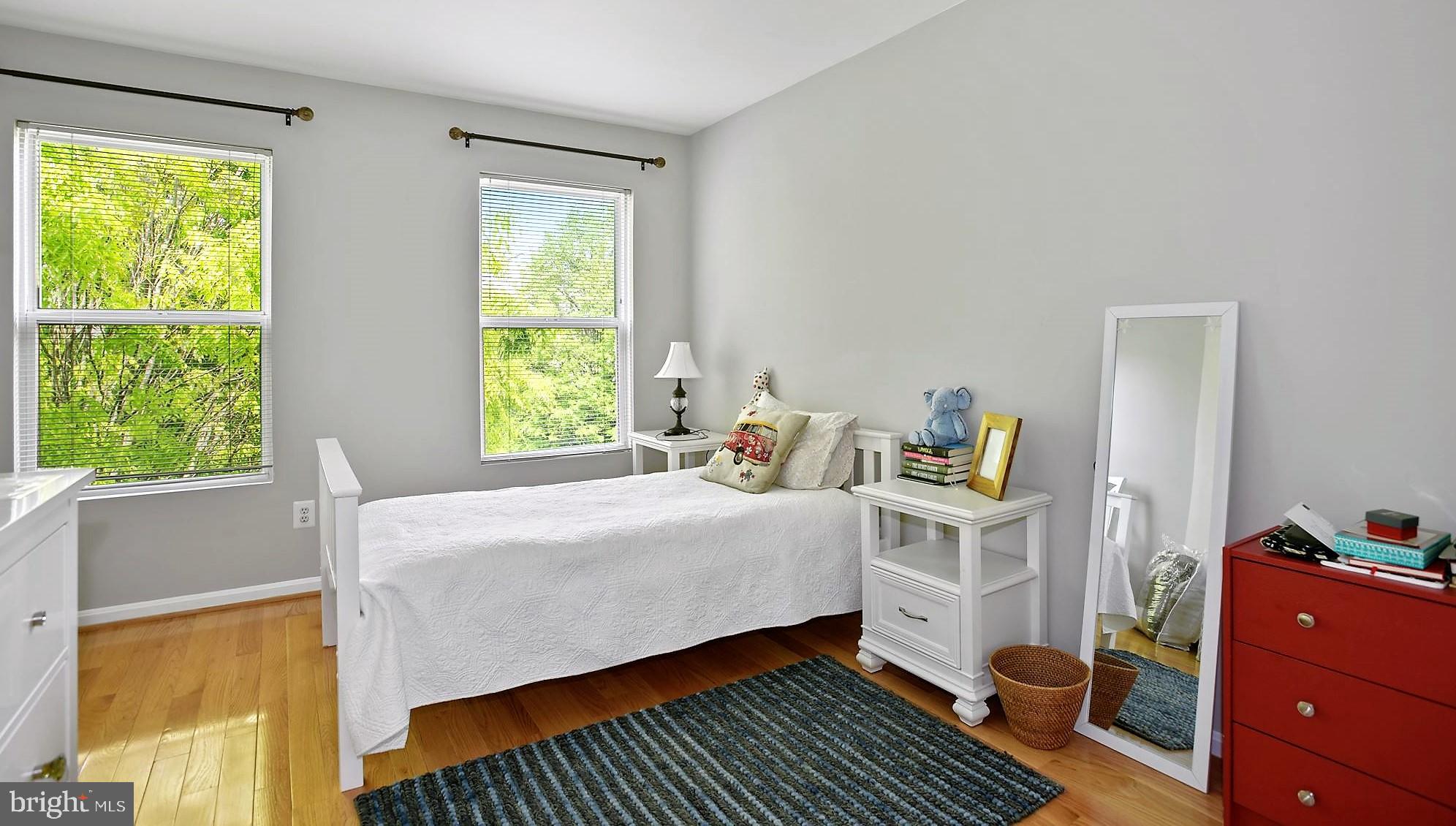12062 Edgemere Circle Reston, VA 20190 - Photo 17 of 25 a bed room with a bed and a window
