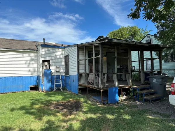 a view of backyard with deck