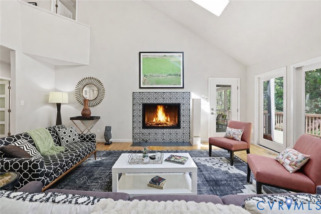 2701 Spring Gate Place Midlothian, VA 23112 - Photo 22 of 65 Living room with a tile fireplace, lofted ceiling,