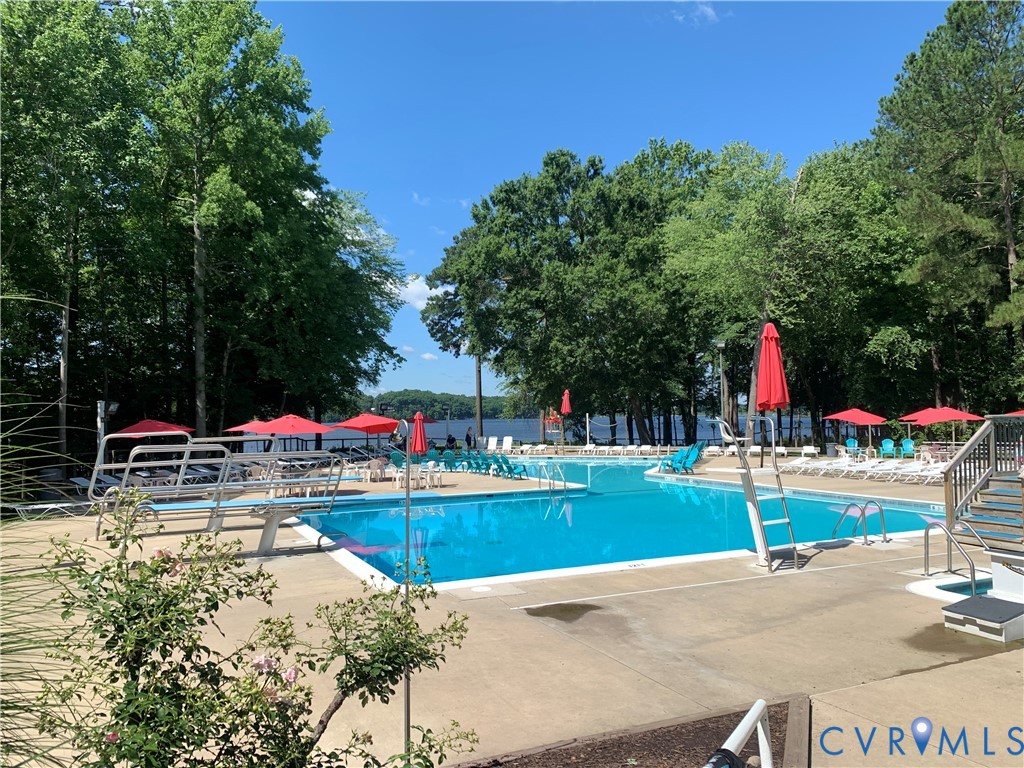 2701 Spring Gate Place Midlothian, VA 23112 - Photo 62 of 65 Community pool with a patio area