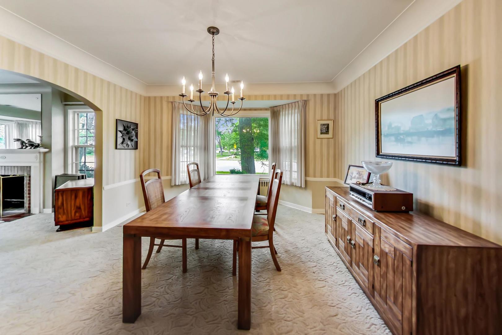 701 South Seminary Avenue Park Ridge, IL 60068 - Photo 12 of 60 a view of a dining room with furniture window and outside view