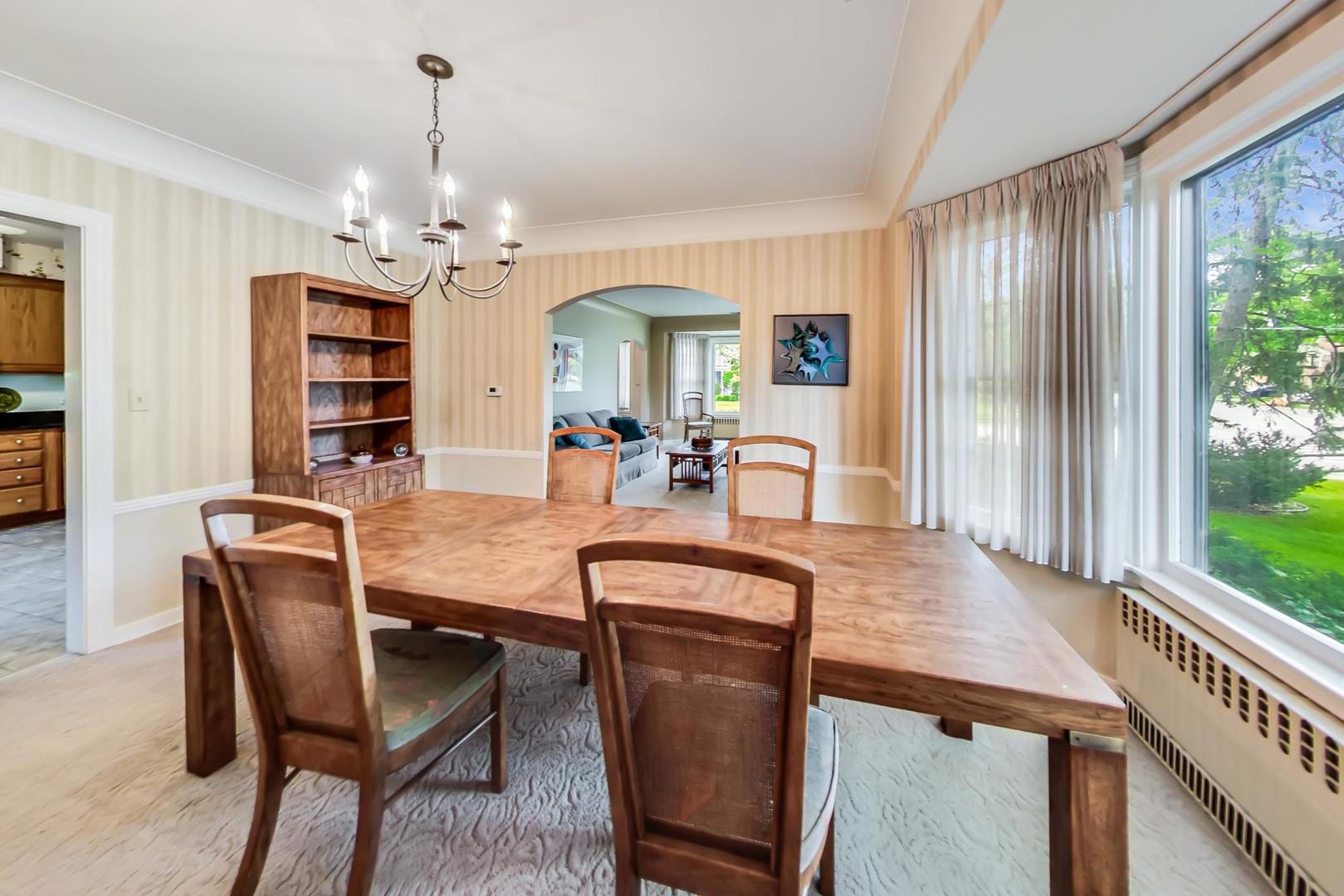 701 South Seminary Avenue Park Ridge, IL 60068 - Photo 13 of 60 a view of a dining room with furniture window and outside view