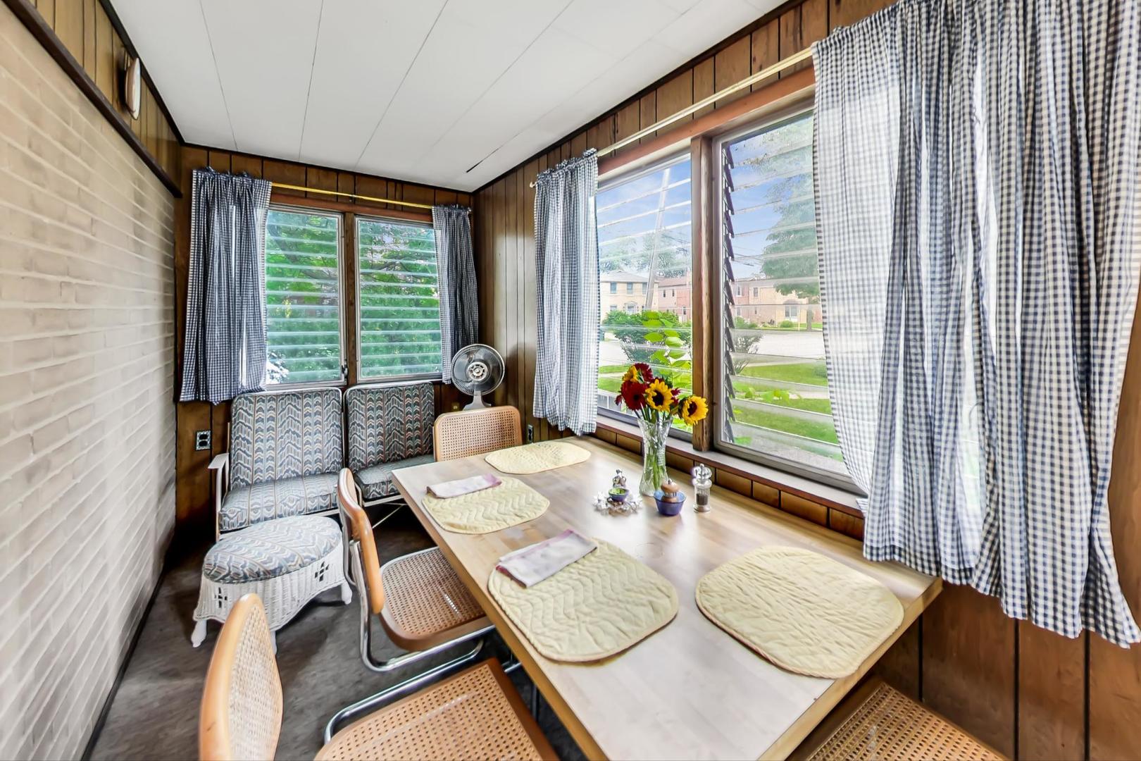 701 South Seminary Avenue Park Ridge, IL 60068 - Photo 18 of 60 a living room with furniture and large windows