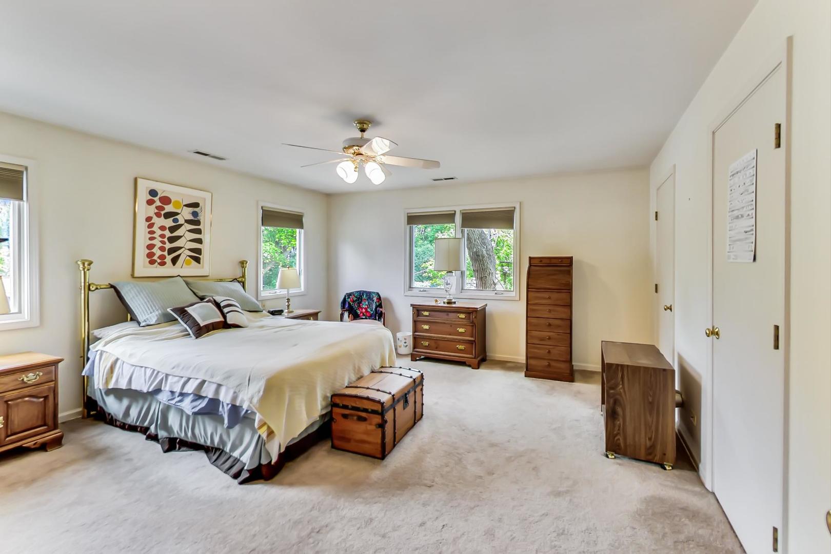 701 South Seminary Avenue Park Ridge, IL 60068 - Photo 27 of 60 a spacious bedroom with a bed and furniture